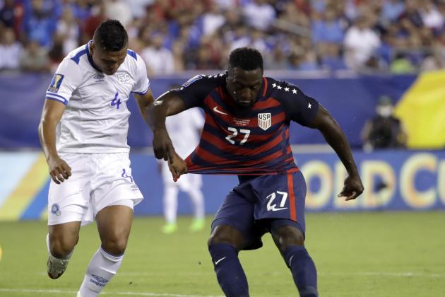 United States' Jozy Altidore (27) is defended by El Salvador's Henry Romero (4) during a CONCACAF Gold Cup quarterfinal soccer match in Philadelphia, Wednesday, July 19, 2017. (AP Photo/Matt Rourke)