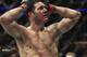 Chris Weidman reacts to his loss to Gerard Mousasi during a middleweight mixed martial arts bout at UFC 210, Saturday, April 8, 2017, in Buffalo, N.Y. (AP Photo/Jeffrey T. Barnes)