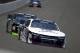 Race driver William Byron leads Justin Allgaier into the first turn during practice for the NASCAR XFINITY series auto race at Indianapolis Motor Speedway, in Indianapolis Friday, July 21, 2017. (AP Photo/Michael Conroy)