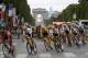 Britain's Chris Froome, wearing the overall leader's yellow jersey, center, rides on the Champs Elysees avenue during the twenty-first and last stage of the Tour de France cycling race over 103 kilometers (64 miles) with start in Montgeron and finish in Paris, France, Sunday, July 23, 2017. (AP Photo/Thibault Camus)