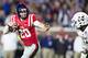 OXFORD, MS - NOVEMBER 26: Shea Patterson #20 of the Mississippi Rebels runs the ball during a game against the Mississippi State Bulldogs at Vaught-Hemingway Stadium on November 26, 2016 in Oxford, Mississippi. The Bulldogs defeated the Rebels 55-20. (Photo by Wesley Hitt/Getty Images)
