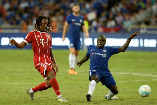 Bayern Munich's Renato Sanches (L) and Chelsea's N'Golo Kante (R) vie for the ball during the International Champions Cup football match between Chelsea and Bayern Munich in Singapore on July 25, 2017. / AFP PHOTO / ROSLAN RAHMAN (Photo credit should read ROSLAN RAHMAN/AFP/Getty Images)