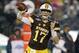 Wyoming quarterback Josh Allen throws during the first half of the Poinsettia Bowl NCAA college football game against BYU on Wednesday, Dec. 21, 2016, in San Diego. (AP Photo/Ryan Kang)