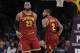 Cleveland Cavaliers' LeBron James greets Kyrie Irving during the second half of an NBA basketball game against the Los Angeles Lakers Sunday, March 19, 2017, in Los Angeles. (AP Photo/Jae C. Hong)