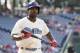Philadelphia Phillies' Howie Kendrick looks on during the first inning of a baseball game against the Arizona Diamondbacks, Saturday, June 17, 2017, in Philadelphia. The Diamondbacks won 5-1. (AP Photo/Chris Szagola)