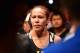Sep 24, 2016; Brasilia, Brazil; Cris Cyborg (red gloves) before her fight against Lina Lansberg (blue gloves) during UFC Fight Night at Nilson Nelson Gymnasium. Mandatory Credit: Jason Silva-USA TODAY Sports