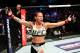 ANAHEIM, CA - JULY 29: Cris Cyborg of Brazil reacts after defeating Tonya Evinger by TKO in their UFC women's featherweight championship bout during the UFC 214 event at Honda Center on July 29, 2017 in Anaheim, California. (Photo by Josh Hedges/Zuffa LLC/Zuffa LLC via Getty Images)