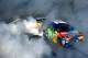 LONG POND, PA - JULY 30: Kyle Busch, driver of the #18 M&M's Caramel Toyota, celebrates with a burnout after winning the Monster Energy NASCAR Cup Series Overton's 400 at Pocono Raceway on July 30, 2017 in Long Pond, Pennsylvania. (Photo by Jared C. Tilton/Getty Images)