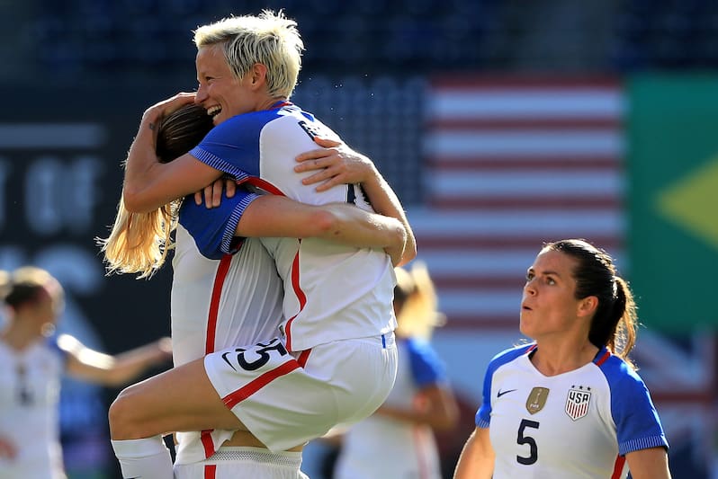 SAN DIEGO, CA - JULY 30: Kelley O'Hara #5, Megan Rapinhoe #15, and Becky Sauerbrunn #3 of the United States celebrate a goal against Brazil during the first half of a match in the 2017 Tournament of Nations at Qualcomm Stadium on July 30, 2017 in San Diego, California. (Photo by Sean M. Haffey/Getty Images)