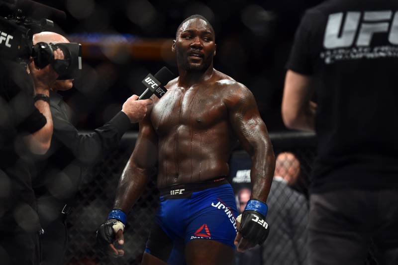 BUFFALO, NY - APRIL 08: Anthony Johnson speaks to Joe Rogan after being defeated by Daniel Cormier in their UFC light heavyweight championship bout during the UFC 210 event at the KeyBank Center on April 8, 2017 in Buffalo, New York. (Photo by Jeff Bottari/Zuffa LLC/Zuffa LLC via Getty Images)