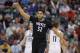 Apr 7, 2017; Salt Lake City, UT, USA; Minnesota Timberwolves center Karl-Anthony Towns (32) reacts to a third quarter three-pointer in the third quarter against the Utah Jazz at Vivint Smart Home Arena. Utah Jazz defeated Minnesota Timberwolves 120-13. Mandatory Credit: Jeff Swinger-USA TODAY Sports