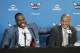Charlotte Hornets' Dwight Howard, left, jokes with general manager Rich Cho, right, during an NBA basketball news conference in Charlotte, N.C., Monday, June 26, 2017, after being traded to the Hornets by the Atlanta Hawks last week. (AP Photo/Chuck Burton)