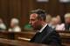 Oscar Pistorius, in the High Court in Pretoria, South Africa, Wednesday, June 15, 2016 on the third day of the double-amputee runner's sentencing hearing for murdering girlfriend Reeva Steenkamp An appeals court found Pistorius guilty of murder and not a lesser charge of culpable homicide for the shooting death of Steenkamp. (AP Photo/Alon Skuy, Pool via AP)