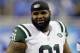 FILE - In this Aug. 13, 2015, file photo, New York Jets defensive end Sheldon Richardson walks off the field following an NFL preseason football game against the Detroit Lions in Detroit. A lapse in judgment cost Richardson the first four games of the season, the result of an NFL-issued suspension for violating the league's substance abuse policy. (AP Photo/Duane Burleson, File)