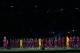 Barcelona's Andres Iniesta, left, addresses the supporters during the presentation of the team for the new season moments before the Joan Gamper trophy soccer match between FC Barcelona and AS Roma at the Camp Nou stadium in Barcelona, Spain, Wednesday, Aug. 5, 2015. (AP Photo/Francisco Seco)