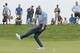 Golden State Warriors NBA basketball player Stephen Curry reacts after missing a birdie putt on the eighth green during the Web.com Tour's Ellie Mae Classic golf tournament Thursday, Aug. 3, 2017, in Hayward, Calif. Curry shot a 4-over-par 74. (AP Photo/Eric Risberg)