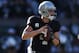 OAKLAND, CA - DECEMBER 24: Derek Carr #4 of the Oakland Raiders rolls out to pass against the Indianapolis Colts during the first quarter of their NFL football game at the Oakland-Alameda County Coliseum on December 24, 2016 in Oakland, California. (Photo by Thearon W. Henderson/Getty Images)