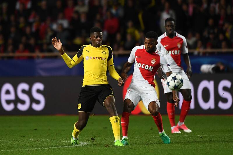 Dortmund's French midfielder Ousmane Dembele (L) and Monaco's French midfielder Thomas Lemar vie for the ball during the UEFA Champions League 2nd leg quarter-final football match AS Monaco v BVB Borussia Dortmund on April 19, 2017 at the Louis II stadium in Monaco. / AFP PHOTO / BORIS HORVAT (Photo credit should read BORIS HORVAT/AFP/Getty Images)