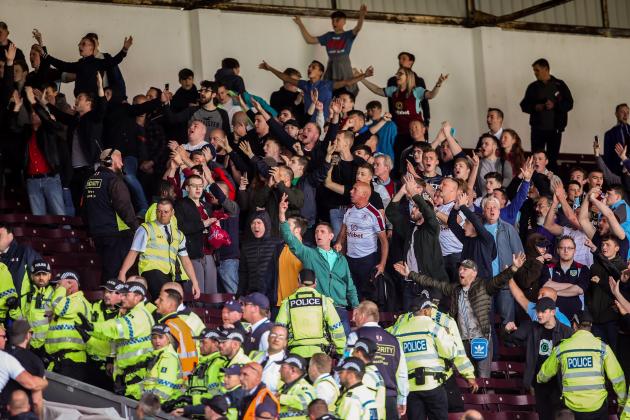 BURNLEY, ENGLAND - AUGUST 05: Burnley fans retaliate to the Hannover 96 fans during the Pre-Season Friendly between Burnley and Hannover 96 at Turf Moor on August 5, 2017 in Burnley, England. (Photo by Robbie Jay Barratt - AMA/Getty Images)