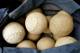 ** ADVANCE FOR MONDAY, OCT. 10 ** A bag of 16-inch softballs is seen on the field before a matchup before a high school game in Chicago, Sept. 28, 2005. Chicago's unique brand of the game that's played with 16-inch balls and without mitts may be following the steel mills into the history books and enthusiasts are hoping that teenagers can keep the sport alive. Six years after 16-inch softball was introduced as a varsity sport in the Chicago Public Schools, the number of schools with teams has doubled from 25 to 50 and expected to increase next year. (AP Photo/Nam Y. Huh)
