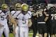 Royal players celebrate as Connell players walk off the field after Royal beat Connell 25-10 to win the Washington Div. 1A high school football championship, Saturday, Dec. 3, 2016, in Tacoma, Wash. (AP Photo/Ted S. Warren)