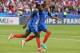 PARIS, FRANCE - JUNE 13: Ousmane Dembele #11 of France celebrates with team-mate Kylian Mbappe #12 after scoring their 3rd goal during the International Friendly match between France and England at Stade de France on June 13, 2017 in Paris, France. (Photo by Xavier Laine/Getty Images)