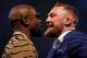 LONDON, ENGLAND - JULY 14: (R-L) Conor McGregor and Floyd Mayweather Jr. face off during the Floyd Mayweather Jr. v Conor McGregor World Press Tour event at SSE Arena on July 14, 2017 in London, England. (Photo by Jeff Bottari/Zuffa LLC/Zuffa LLC via Getty Images)