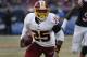 Washington Redskins running back Chris Thompson (25) runs against the Chicago Bears during the first half of an NFL football game, Saturday, Dec. 24, 2016, in Chicago. (AP Photo/Nam Y. Huh)