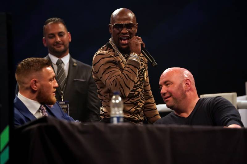 LONDON, ENGLAND - JULY 14: (R-L) Floyd Mayweather Jr. speaks to Conor McGregor during the Floyd Mayweather Jr. v Conor McGregor World Press Tour event at SSE Arena on July 14, 2017 in London, England. (Photo by Jeff Bottari/Zuffa LLC/Zuffa LLC via Getty Images)
