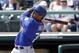 New York Mets' Dominic Smith bats against the Atlanta Braves in a spring training baseball game, Friday, March 10, 2017, in Kissimmee, Fla. (AP Photo/John Raoux)