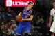 New York Knicks forward Kristaps Porzingis (6) in the second half of an NBA basketball game Saturday, Dec. 17, 2016, in Denver. The Nuggets won 127-114. (AP Photo/David Zalubowski)