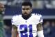 ARLINGTON, TX - JANUARY 15: Ezekiel Elliott #21 of the Dallas Cowboys looks on before the NFC Divisional Playoff game against the Green Bay Packers at AT&T Stadium on January 15, 2017 in Arlington, Texas. The Packers defeated the Cowboys 34-31. (Photo by Joe Robbins/Getty Images)