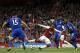 Arsenal's French striker Alexandre Lacazette (2nd L) has an unsuccessful shot as Leicester City's English defender Harry Maguire (L), Leicester City's Nigerian midfielder Wilfred Ndidi and Leicester City's English-born Jamaican defender Wes Morgan (R) look on during the English Premier League football match between Arsenal and Leicester City at the Emirates Stadium in London on August 11, 2017. / AFP PHOTO / Ian KINGTON / RESTRICTED TO EDITORIAL USE. No use with unauthorized audio, video, data, fixture lists, club/league logos or 'live' services. Online in-match use limited to 75 images, no video emulation. No use in betting, games or single club/league/player publications. / (Photo credit should read IAN KINGTON/AFP/Getty Images)