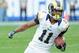 Los Angeles Rams wide receiver Tavon Austin (11) gains yards on a reverse in the first quarter of a game against the Atlanta Falcons played at the Los Angeles Memorial Coliseum in Los Angeles on Sunday, Dec. 11, 2016. (AP Photo/John Cordes)