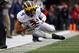 COLUMBUS, OH - NOVEMBER 26: Grant Perry #9 of the Michigan Wolverines dives for a pass during the second quarter against the Ohio State Buckeyes at Ohio Stadium on November 26, 2016 in Columbus, Ohio. (Photo by Gregory Shamus/Getty Images)