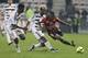 Nice's Jean Michael Seri, right,challenges for the ball with Lorient's Didier Ndong, center and, Lorient's Lamine Gassama during the French League One soccer match between Nice and FC Lorient, Saturday, Jan. 23, 2016, in Nice stadium, southeastern France. (AP Photo/Lionel Cironneau)