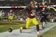 FILE - In this Nov. 20, 2016, file photo, Washington Redskins running back Rob Kelley (32) celebrates his touchdown during the second half of an NFL football game against the Green Bay Packers, in Landover, Md. The surprising success by such low-profile rushers as Jay Ajayi, Jordan Howard, Robert Kelley and Tim Hightower speaks to the challenge of evaluating running backs _ and the high injury rate at the position. (AP Photo/Patrick Semansky, File)