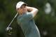 Rory McIlroy of Northern Ireland, watches his tee shot on the third hole during the third round of the PGA Championship golf tournament at the Quail Hollow Club Saturday, Aug. 12, 2017, in Charlotte, N.C. (AP Photo/Chuck Burton)