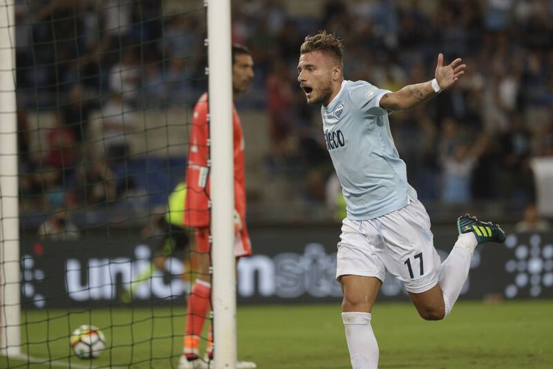 Lazio's Ciro Immobile celebrates after scoring during the Italian Super Cup final match between Lazio and Juventus at Rome's Olympic stadium, Sunday, Aug. 13, 2017. (AP Photo/Gregorio Borgia)