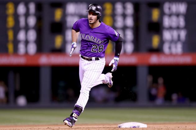 DENVER, CO - AUGUST 04:  Nolan Arenado #28 of the Colorado Rockies circle the bases after hitting a solo home run in the ninth inning against the Philadelphia Phillies at Coors Field on August 4, 2017 in Denver, Colorado.  (Photo by Matthew Stockman/Getty Images)