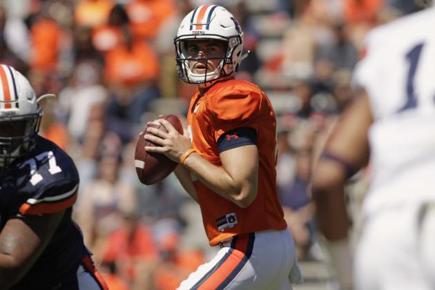 FILE - In this April 8, 2017, file photo, Auburn quarterback Jarrett Stidham looks for a receiver during Auburn's NCAA college football spring game in Auburn, Ala. Stidham, who began his college career at Baylor, went 16 of 20 for 267 yards in the spring game. (AP Photo/Todd J. Van Emst, File)