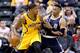 INDIANAPOLIS, IN - MARCH 19: Paul George #13 of the Indiana Pacers dribbles the ball while defended by Russell Westbrook #0 of the Oklahoma City Thunder at Bankers Life Fieldhouse on March 19, 2016 in Indianapolis, Indiana. NOTE TO USER: User expressly acknowledges and agrees that, by downloading and or using this photograph, User is consenting to the terms and conditions of the Getty Images License Agreement. (Photo by Andy Lyons/Getty Images)
