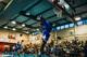 Aidan Igiehon goes up strong for a two-hand dunk.