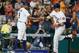 HOUSTON, TX - AUGUST 01: Carlos Beltran #15 of the Houston Astros is congratulated by third base coach Gary Pettis #8 after hitting a home run in the fifth inning against the Tampa Bay Rays at Minute Maid Park on August 1, 2017 in Houston, Texas. (Photo by Bob Levey/Getty Images)