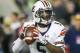 Auburn quarterback John Franklin III (5) drops back to pass against Alabama during the second half of the Iron Bowl NCAA college football game, Saturday, Nov. 26, 2016, in Tuscaloosa, Ala. (AP Photo/Butch Dill)