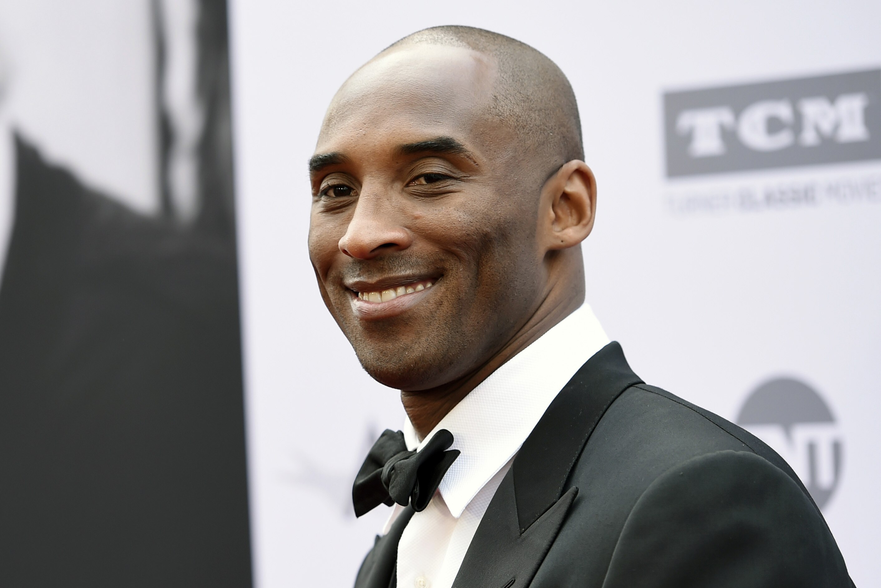 FILE - In this June 9, 2016, file photo, retired NBA basketball player Kobe Bryant poses at the 2016 AFI Life Achievement Award Gala Tribute to John Williams in Los Angeles. Bryant came through with an assist for some high school students in Indiana by retweeting one student's request on May 18, 2017, to get them out of a final exam. (Photo by Chris Pizzello/Invision/AP, File)