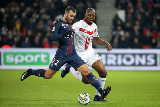 PARIS, FRANCE - DECEMBER 14: Jese Rodriguez of PSG and Stoppila Sunzu aka Stophira Sunzu of Lille in action during the French League Cup (Coupe de la Ligue) match between Paris Saint-Germain (PSG) and Lille OSC at Parc des Princes stadium on December 14, 2016 in Paris, France. (Photo by Jean Catuffe/Getty Images,)