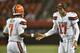 Cleveland Browns quarterback Brock Osweiler (17) congratulates quarterback DeShone Kizer after a Browns touchdown during the second half of an NFL preseason football game against the New Orleans Saints on Thursday, Aug. 10, 2017, in Cleveland. (AP Photo/David Richard)