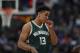 Milwaukee Bucks guard Malcolm Brogdon (13) in the first half of an NBA basketball game Friday, Feb. 3, 2017, in Denver. (AP Photo/David Zalubowski)