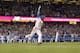 Los Angeles Dodgers' Yasiel Puig celebrates as he runs to first after hitting a two-run double during the ninth inning to give the Dodgers a 5-4 win in a baseball game against the Chicago White Sox, Wednesday, Aug. 16, 2017, in Los Angeles. (AP Photo/Mark J. Terrill)